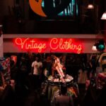 Market Culture - Neon sign in shop with vintage clothes