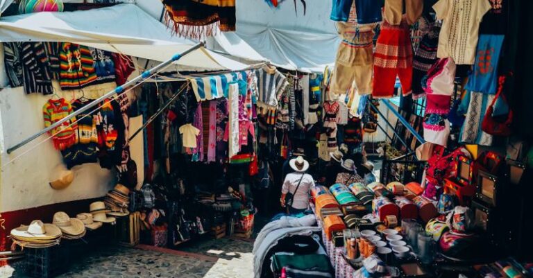 Flea Markets - Assorted-color Clothes Display on Street