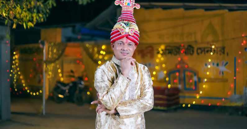 Traditional Festivals - A man in traditional clothing poses for a photo