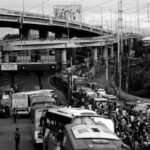 Electric Buses - Jammed Traffic in Gray Scale Photography