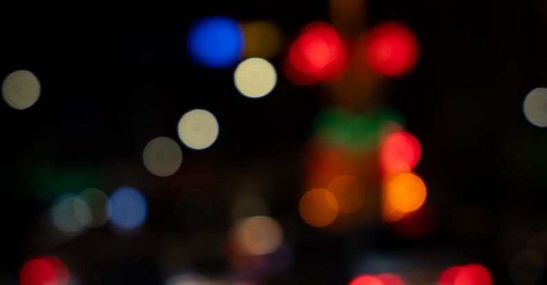 Responsible Nightlife - Blurry night photo of traffic lights