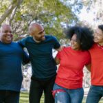 Family-Friendly Events - Group of People Wearing Blue and Red Shirts