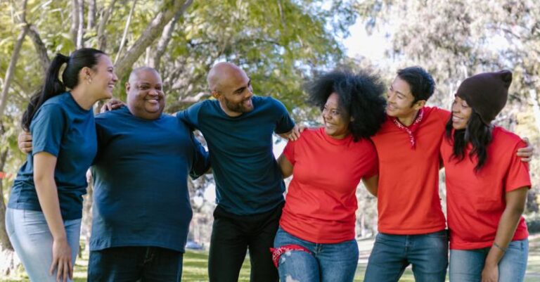 Family-Friendly Events - Group of People Wearing Blue and Red Shirts