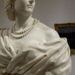 Art Exhibitions - A bust of a woman in a museum