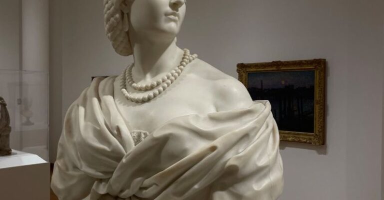 Art Exhibitions - A bust of a woman in a museum