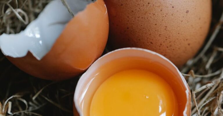 Local Cuisine - Raw brown chicken eggs placed in small wicker basket